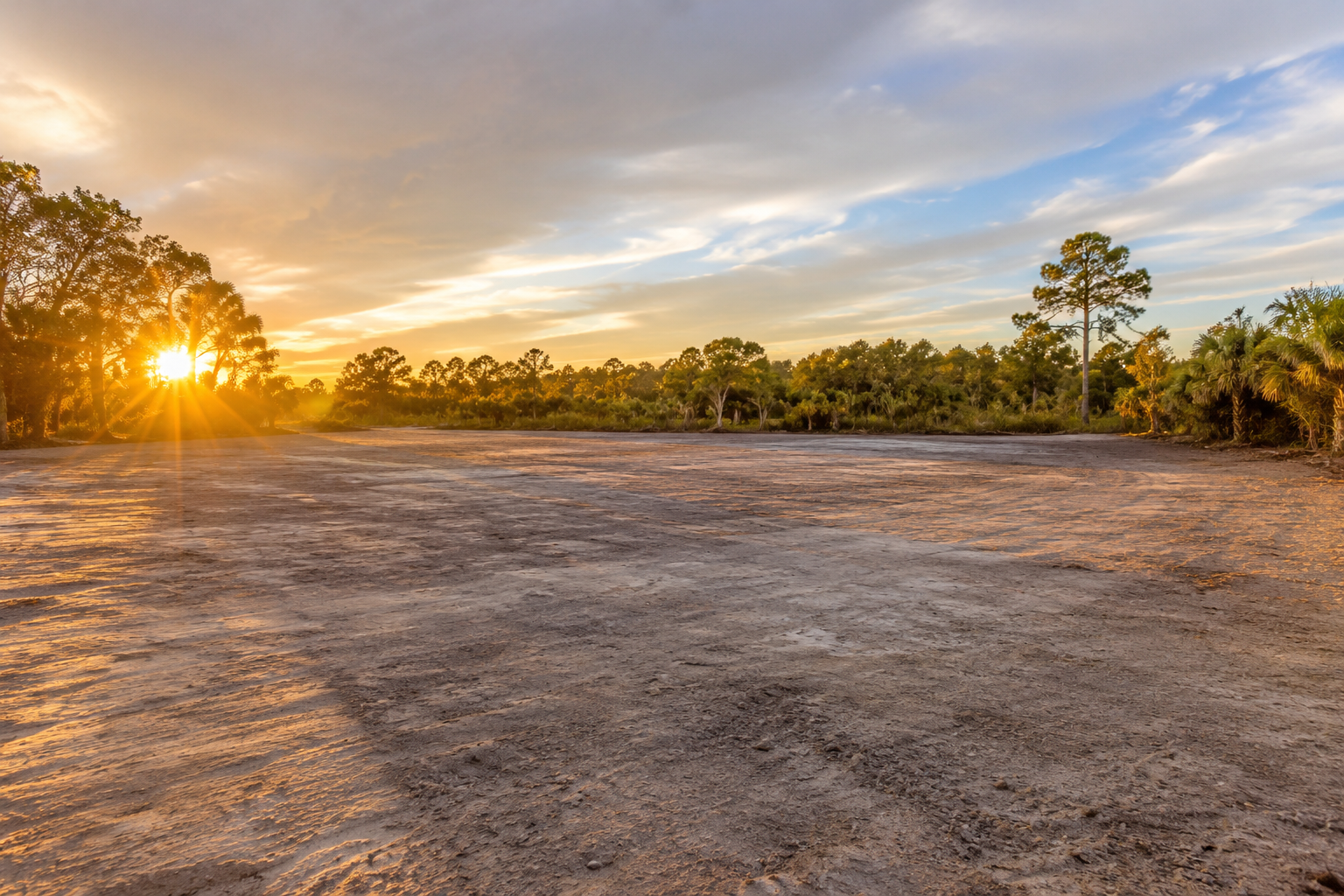Sunset view of a fully cleared open lot